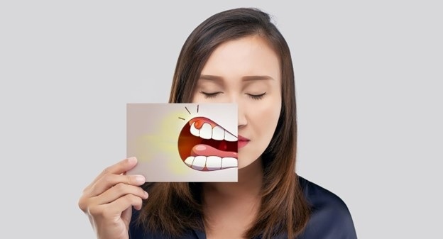 Một số dấu hiệu trên miệng có thể cảnh báo về sức khỏe gan. Ảnh: Istock