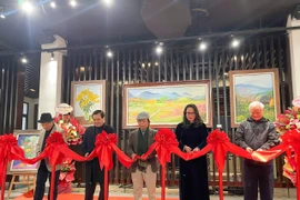 Tet colours fill painting exhibition in Hanoi