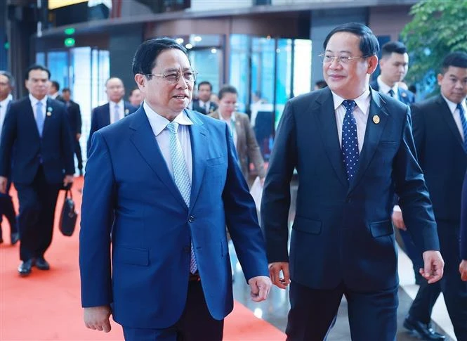 Vietnamese Prime Minister Pham Minh Chinh (left) and his Lao counterpart Sonexay Siphandone in Kunming city, China, on November 6. (Photo: VNA)